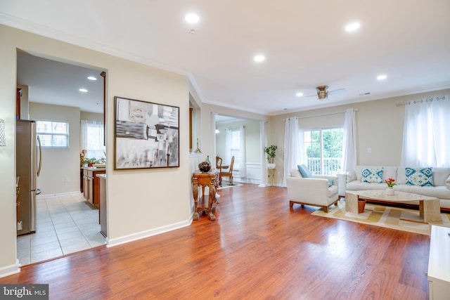 9722 Holmes Pl Unit 307, Manassas Park, VA 20111 - living room with light wood-type flooring, crown molding, recessed lighting, and a ceiling fan