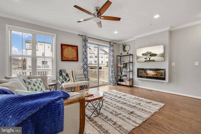 13304 Windy Meadow Ln, Silver Spring, MD 20906 - living area with ornamental molding, ceiling fan, wood finished floors, baseboards, and recessed lighting