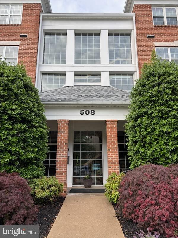 508 Limerick Cir Unit 402, Lutherville Timonium, MD 21093 - view of exterior entry with brick siding