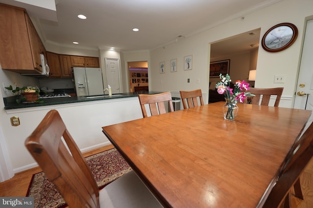 508 Limerick Cir Unit 402, Lutherville Timonium, MD 21093 - dining room featuring crown molding, recessed lighting, and light wood-style flooring