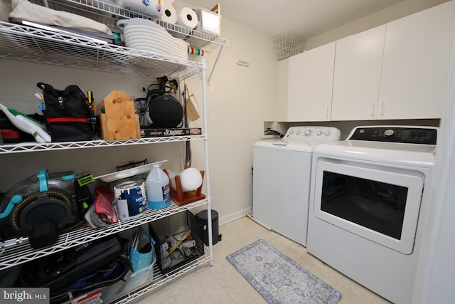 508 Limerick Cir Unit 402, Lutherville Timonium, MD 21093 - laundry area with separate washer and dryer, cabinet space, and baseboards