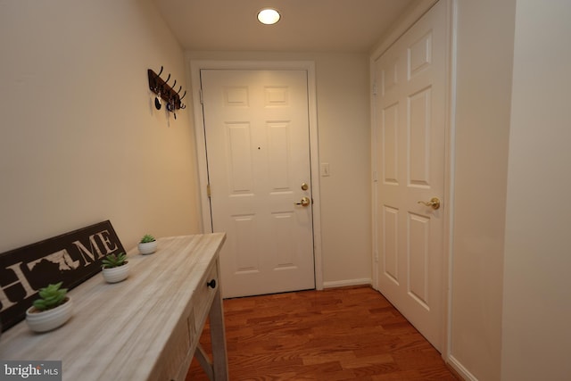 508 Limerick Cir Unit 402, Lutherville Timonium, MD 21093 - doorway to outside featuring wood finished floors, recessed lighting, and baseboards