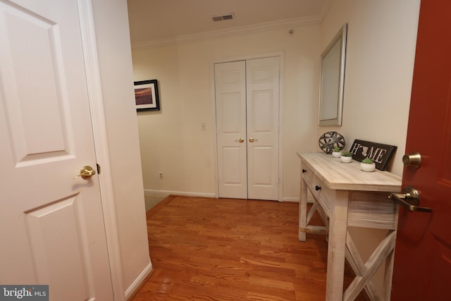 508 Limerick Cir Unit 402, Lutherville Timonium, MD 21093 - hallway with light wood-style flooring, ornamental molding, and baseboards