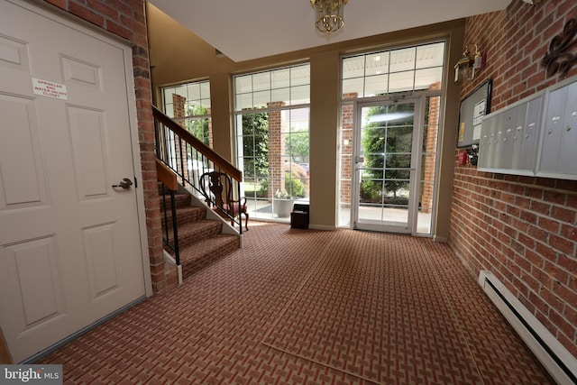 508 Limerick Cir Unit 402, Lutherville Timonium, MD 21093 - carpeted entrance foyer with baseboard heating, brick wall, and stairs