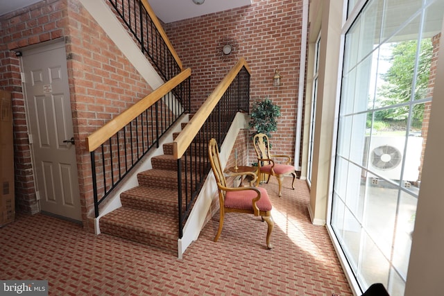 508 Limerick Cir Unit 402, Lutherville Timonium, MD 21093 - stairs with carpet floors and brick wall