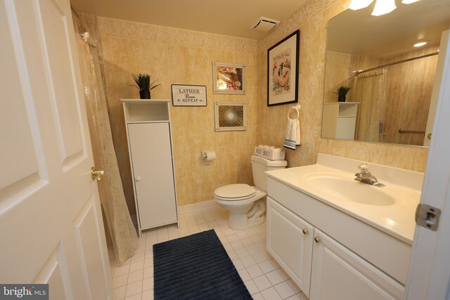 508 Limerick Cir Unit 402, Lutherville Timonium, MD 21093 - bathroom with tile patterned flooring, vanity, toilet, and a shower with shower curtain