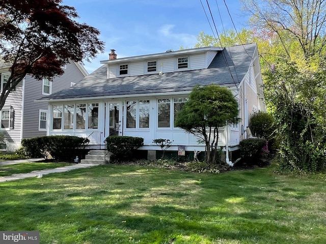 1924 Juniata, Norristown, PA 19403 - bungalow-style home with a front lawn, roof with shingles, and a chimney
