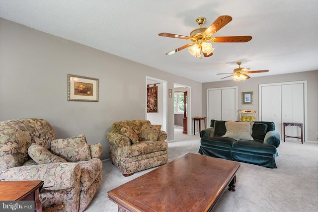 23359 Patuxent View Rd, Lexington Park, MD 20653 - living area featuring light carpet, a ceiling fan, and baseboards