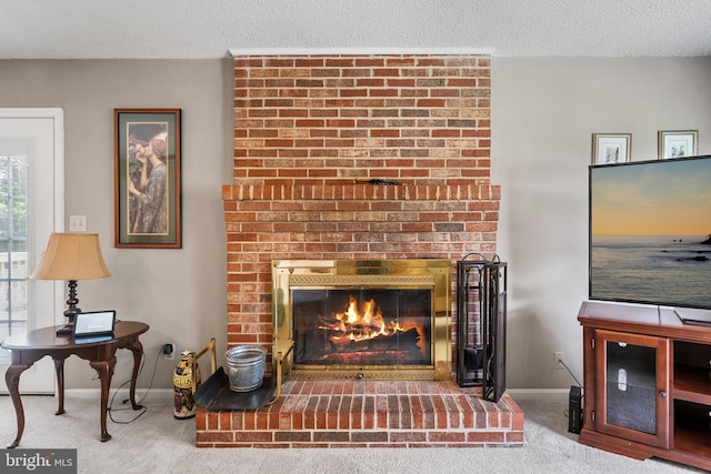 23359 Patuxent View Rd, Lexington Park, MD 20653 - detailed view of carpet, baseboards, a fireplace, and a textured ceiling