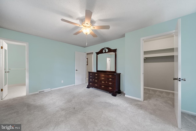 23359 Patuxent View Rd, Lexington Park, MD 20653 - unfurnished bedroom featuring a spacious closet, carpet floors, a closet, and baseboards