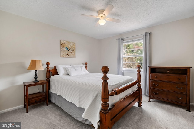 23359 Patuxent View Rd, Lexington Park, MD 20653 - bedroom with light colored carpet, baseboards, ceiling fan, and a textured ceiling