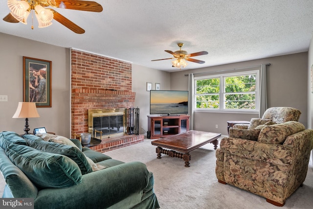 23359 Patuxent View Rd, Lexington Park, MD 20653 - carpeted living area featuring a ceiling fan, a brick fireplace, and a textured ceiling