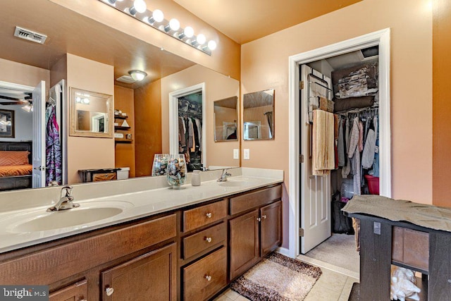 109 Riverwalk Blvd, Burlington, NJ 08016 - full bath featuring double vanity, tile patterned floors, a walk in closet, and ensuite bath