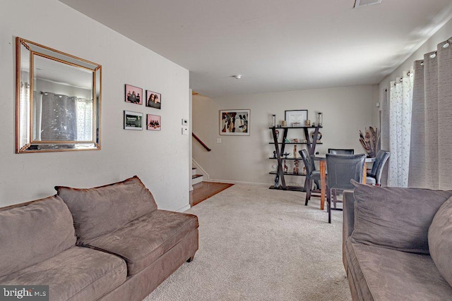 109 Riverwalk Blvd, Burlington, NJ 08016 - carpeted living room featuring stairway