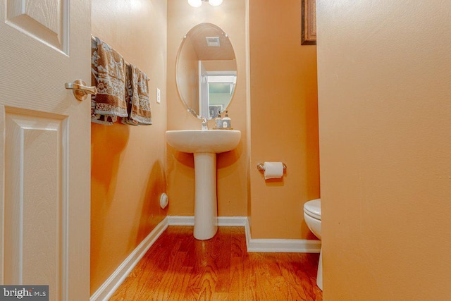 109 Riverwalk Blvd, Burlington, NJ 08016 - half bathroom with toilet, wood finished floors, and baseboards