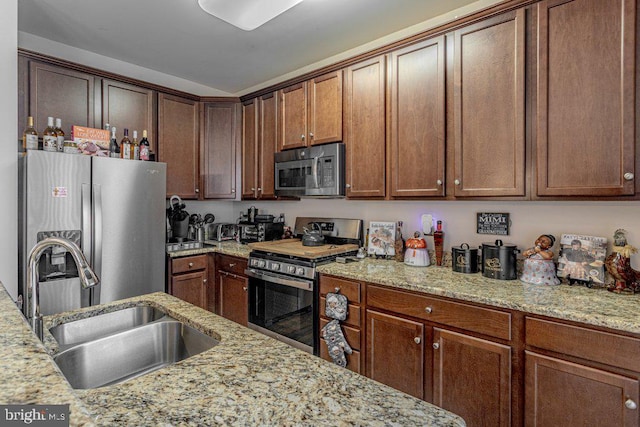 109 Riverwalk Blvd, Burlington, NJ 08016 - kitchen featuring stainless steel appliances, a sink, and light stone countertops