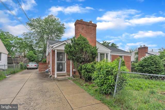 224 University Blvd E, Silver Spring, MD 20901 - view of front of house featuring brick siding and concrete driveway