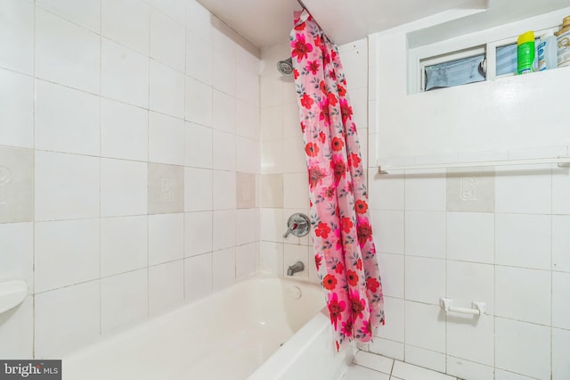 224 University Blvd E, Silver Spring, MD 20901 - full bathroom featuring shower / bath combo and tile walls