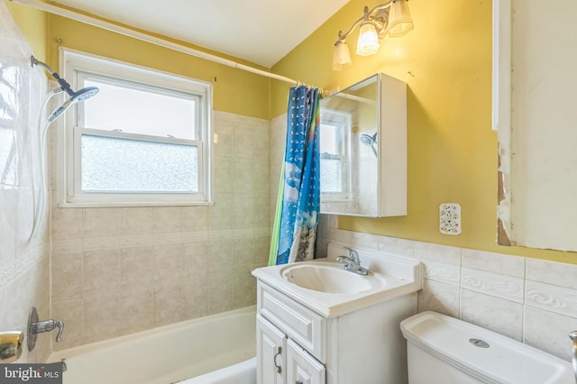 224 University Blvd E, Silver Spring, MD 20901 - bathroom featuring shower / bath combo, vanity, toilet, and tile walls