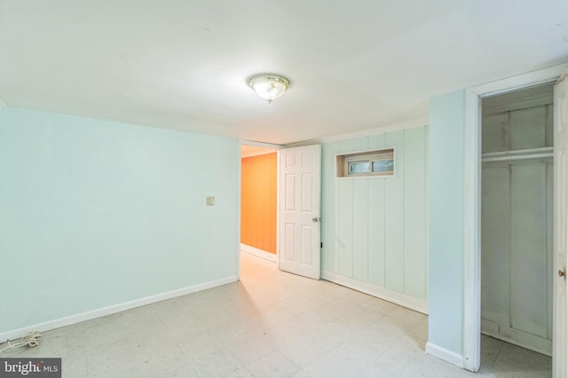 224 University Blvd E, Silver Spring, MD 20901 - unfurnished bedroom featuring tile patterned floors, baseboards, and a closet