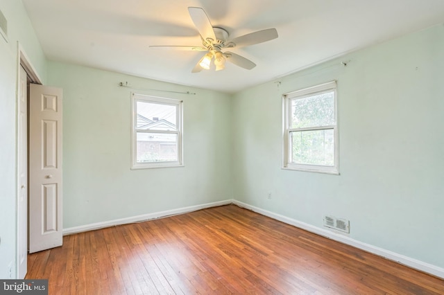 224 University Blvd E, Silver Spring, MD 20901 - empty room with plenty of natural light, hardwood / wood-style floors, baseboards, and ceiling fan
