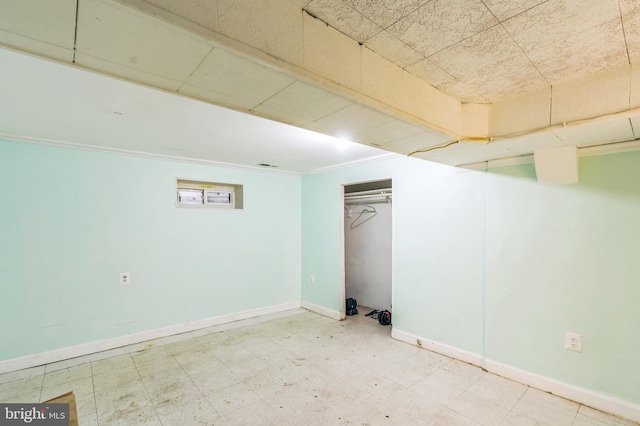 224 University Blvd E, Silver Spring, MD 20901 - finished below grade area featuring baseboards, crown molding, and tile patterned floors