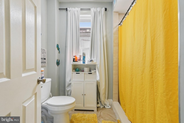 3125 N 7th St, Philadelphia, PA 19133 - bathroom featuring toilet, a shower with shower curtain, and tile patterned flooring