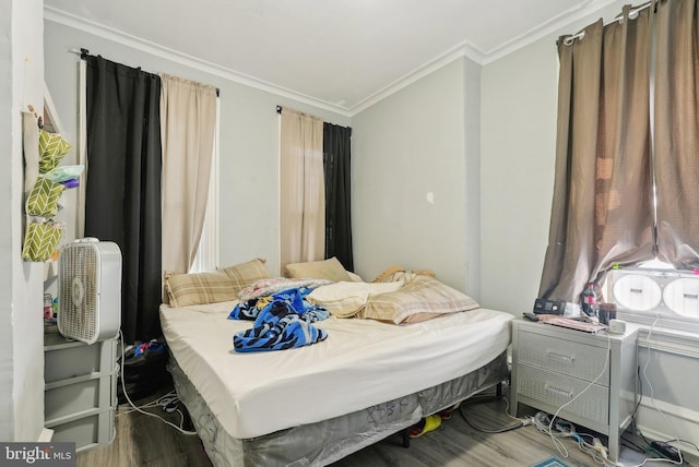 3125 N 7th St, Philadelphia, PA 19133 - bedroom featuring ornamental molding and wood finished floors