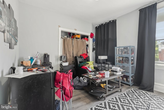 3125 N 7th St, Philadelphia, PA 19133 - bedroom with wood finished floors, a closet, and baseboards