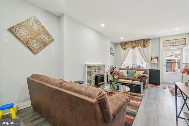 3125 N 7th St, Philadelphia, PA 19133 - living room with wood finished floors, recessed lighting, baseboards, and a fireplace