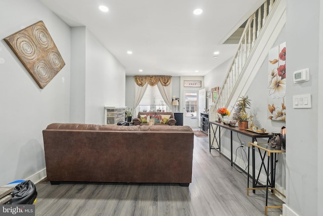 3125 N 7th St, Philadelphia, PA 19133 - living area featuring wood finished floors, stairs, baseboards, and recessed lighting