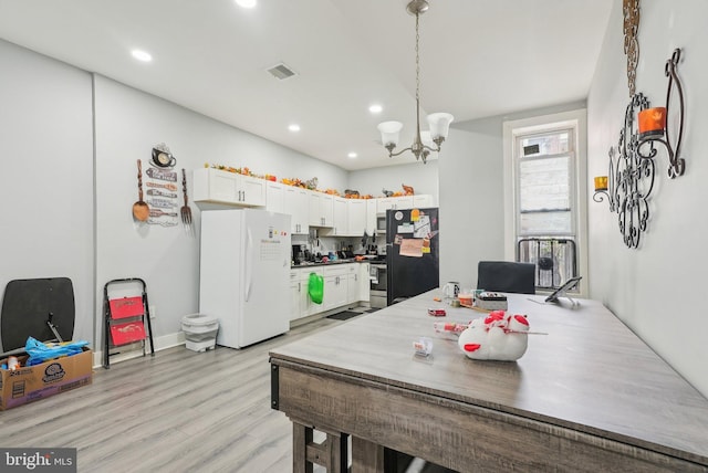 3125 N 7th St, Philadelphia, PA 19133 - dining space featuring recessed lighting, a chandelier, and light wood finished floors
