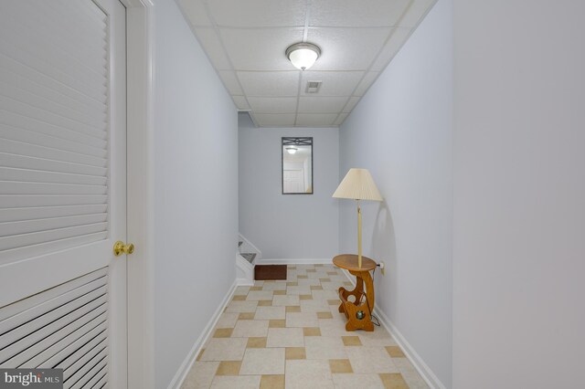 680 Mara Rose Ln, Harpers Ferry, WV 25425 - hallway with a drop ceiling, baseboards, and stairway