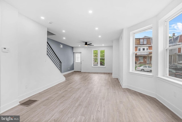 10 W Pomona St, Philadelphia, PA 19144 - unfurnished living room with stairs, recessed lighting, light wood finished floors, baseboards, and a ceiling fan