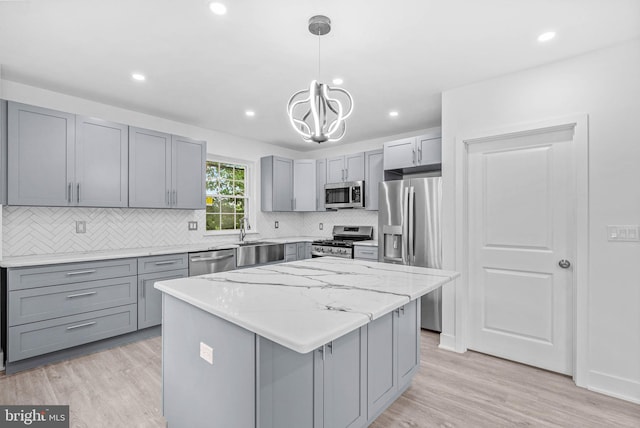 10 W Pomona St, Philadelphia, PA 19144 - kitchen featuring stainless steel appliances, gray cabinetry, tasteful backsplash, and recessed lighting