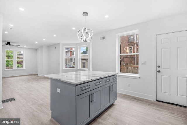 10 W Pomona St, Philadelphia, PA 19144 - kitchen featuring gray cabinetry, baseboards, light wood finished floors, recessed lighting, and a chandelier