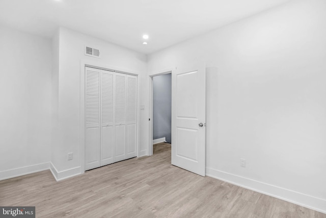 10 W Pomona St, Philadelphia, PA 19144 - unfurnished bedroom with wood finished floors, baseboards, a closet, and recessed lighting