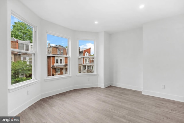 10 W Pomona St, Philadelphia, PA 19144 - empty room with wood finished floors, recessed lighting, and baseboards