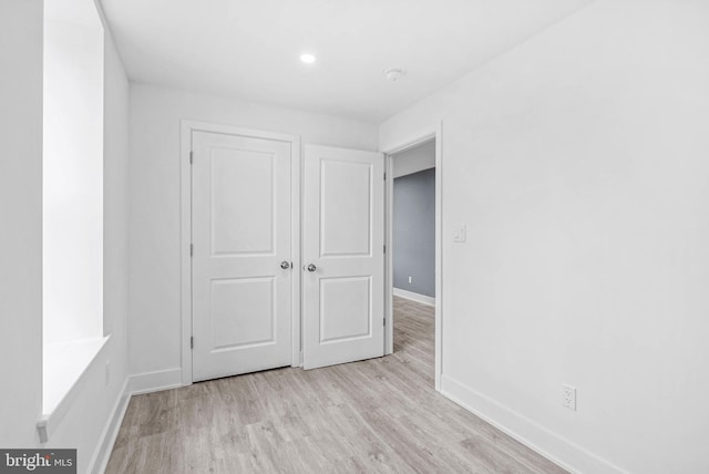 10 W Pomona St, Philadelphia, PA 19144 - unfurnished bedroom featuring baseboards, light wood-style flooring, a closet, and recessed lighting
