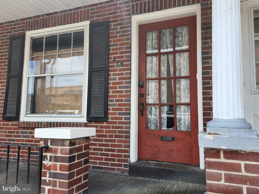 444 Moss St, Reading, PA 19604 - property entrance with brick siding