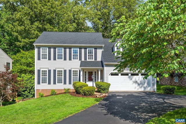 1902 English Oaks Cir N, Charlottesville, VA 22911 - colonial home featuring asphalt driveway, roof with shingles, a front yard, and a garage
