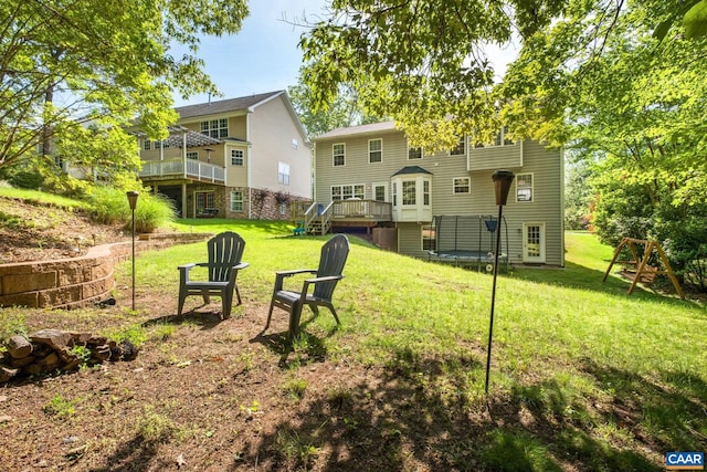 1902 English Oaks Cir N, Charlottesville, VA 22911 - view of grassy yard with a deck