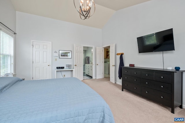 1902 English Oaks Cir N, Charlottesville, VA 22911 - bedroom featuring light carpet, a chandelier, high vaulted ceiling, washer / dryer, and ensuite bathroom