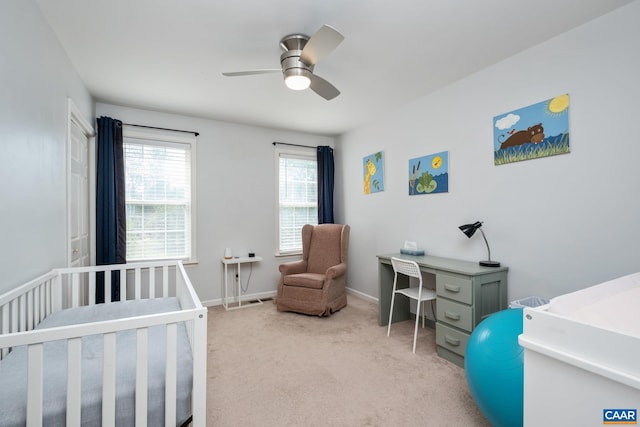 1902 English Oaks Cir N, Charlottesville, VA 22911 - bedroom featuring a crib, light colored carpet, ceiling fan, and baseboards