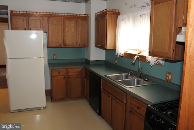 5077 Lincoln Hwy W, Thomasville, PA 17364 - kitchen featuring black appliances, a sink, brown cabinets, and wall chimney range hood
