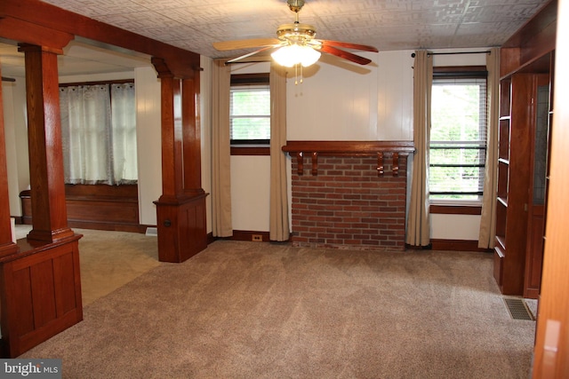 5077 Lincoln Hwy W, Thomasville, PA 17364 - unfurnished living room with carpet, a ceiling fan, ornate columns, plenty of natural light, and an ornate ceiling