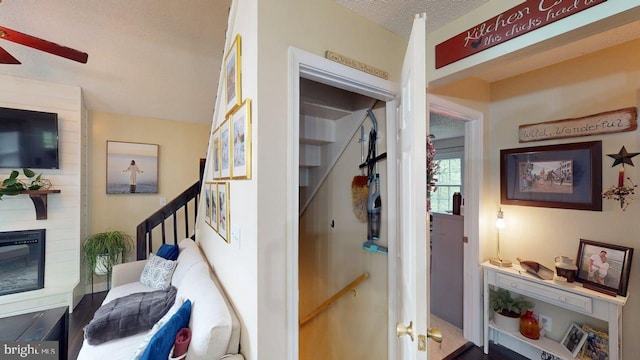 240 Dogwood Dr, Romney, WV 26757 - corridor with stairs and a textured ceiling