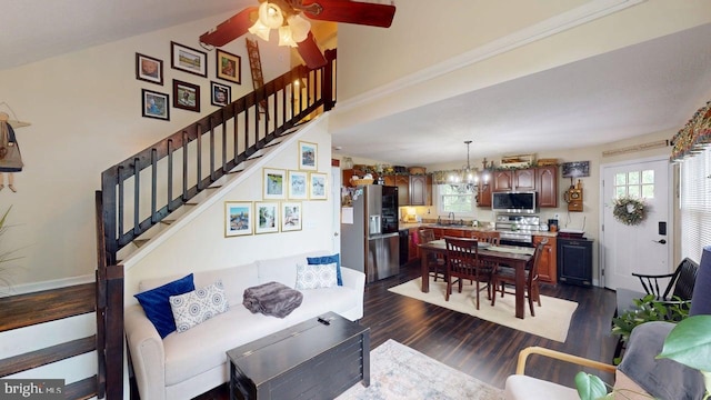 240 Dogwood Dr, Romney, WV 26757 - living area featuring stairway, a chandelier, ceiling fan, and dark wood finished floors