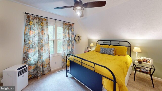 240 Dogwood Dr, Romney, WV 26757 - carpeted bedroom featuring multiple windows, vaulted ceiling, baseboards, and a ceiling fan