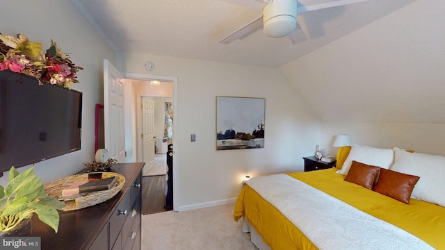 240 Dogwood Dr, Romney, WV 26757 - bedroom featuring light carpet, vaulted ceiling, a ceiling fan, and baseboards